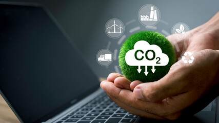 Businessman analyzing global green network connection with modern concept, reducing CO2 emissions...