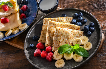 Home-made Polish pancakes filled with sweet cottage cheese