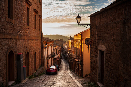 Street with old houses at Aidone, Enna province, Sicily in Italy