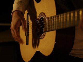 Fototapeta premium Playing Classic Guitar, Flamenco Style, Dark Concept, Elegance