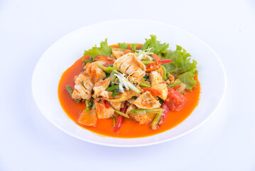 Thai favourite food. Stir Fried Squid with Curry on the white dish.