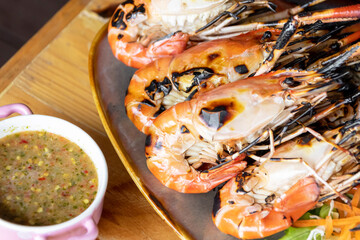 Charcoal grilled river prawns usually served with spicy seafood.