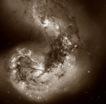 Antennae Galaxies or NGC 4038 or NGC 4039.  Retouched image. Elements of This Image Furnished by NASA. Artwork