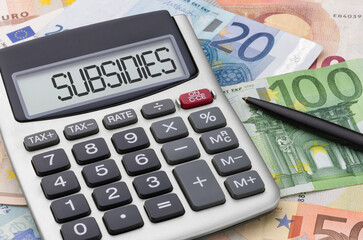 Calculator with money and a pen - Subsidies