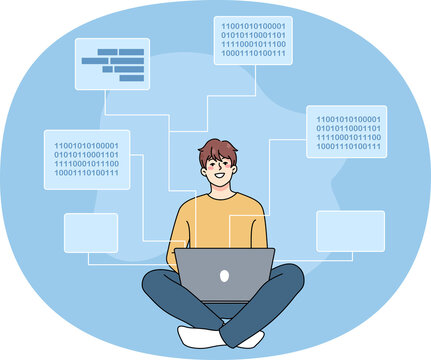 Smiling software engineer writing codes on computer