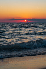 Fototapeta na wymiar amazing view of sand beach sunset, golden sun and clouds
