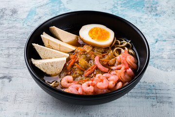 Dashi broth with nori, egg, shrimp, tofu cheese and egg noodles.