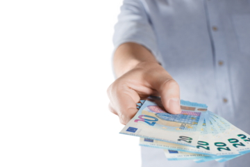 Hand giving a stack of euro banknotes, cut out
