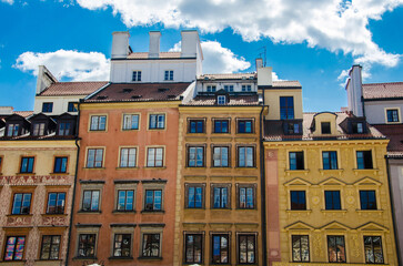 Fototapeta na wymiar Warsaw, Poland - June 12, 2023. Colorful Houses on the Market Square in Warsaw Old Town