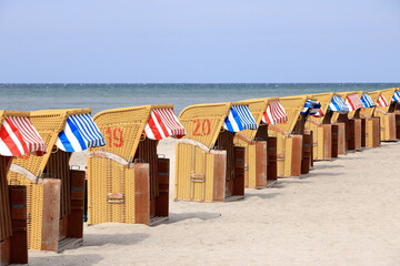 hooded beach chairs at the baltic sea in timmendorf, germany, island poel