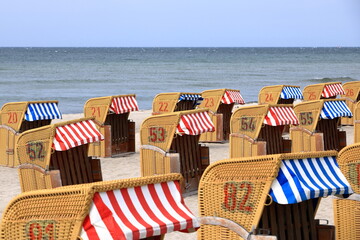 hooded beach chairs at the baltic sea in timmendorf, germany, island poel