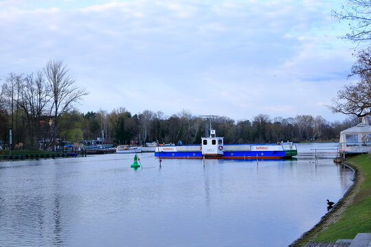 April 5 2023 - Caputh, Brandenburg, Germany: The cable ferry called Tussy 2 for cars and people connects Caputh and Geltow on the Havel waterway