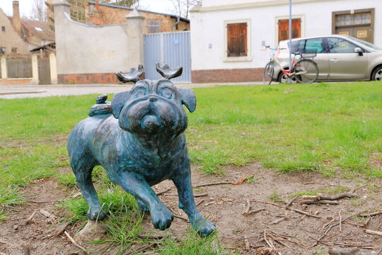 April 7 2023 - Brandenburg, Germany: wood pug sculpture in the city, in memory of Loriot