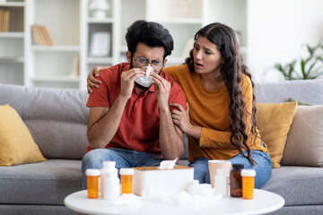 Family Support. Loving Indian Woman Taking Care About Her Ill Husband