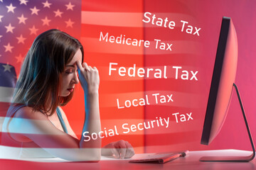 US taxes. Woman at computer. Sad girl pays taxes. Concept of high taxes in USA. Payments to federal...