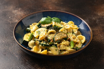 Lemon infused Orecchiette pasta with courgette or zucchini and asparagus