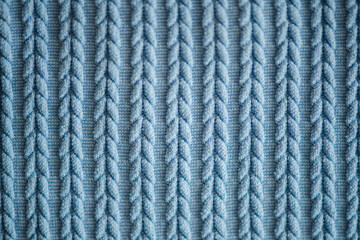 Background texture of fabric with braids pattern top view closeup. Selective focus.