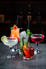 Set of classic alcoholic cocktails, fresh cold drinks.