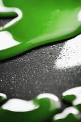 Green abstract liquid, colorful fantasy background with green slime and small particles