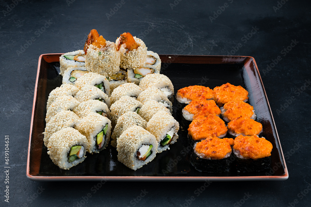 Poster sushi roll set with salmon, shrimps, avocado, philadelphia cheese, cucumber, japanese food.