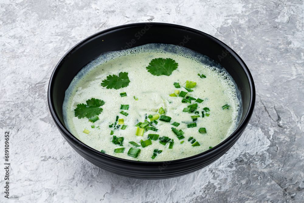 Sticker Kefir soup with green onions and cilantro.