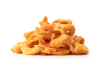 Dried melon slices isolated on a white background.