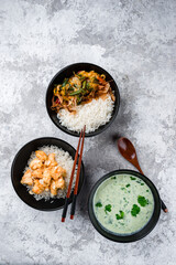 Rice with fried chicken fillet, vegetables and tuna shavings with kefir soup, fresh food.