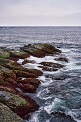 rugged coastline with crashing waves