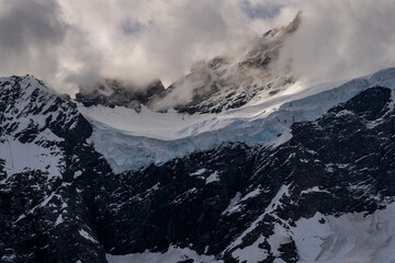 snow covered glacier mountains in winter