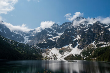 beautiful landscape view of Lake Morskie Oko in the mountains with clear water and reflection in Zakopane Poland in the Tatra National Park © Sheviakova