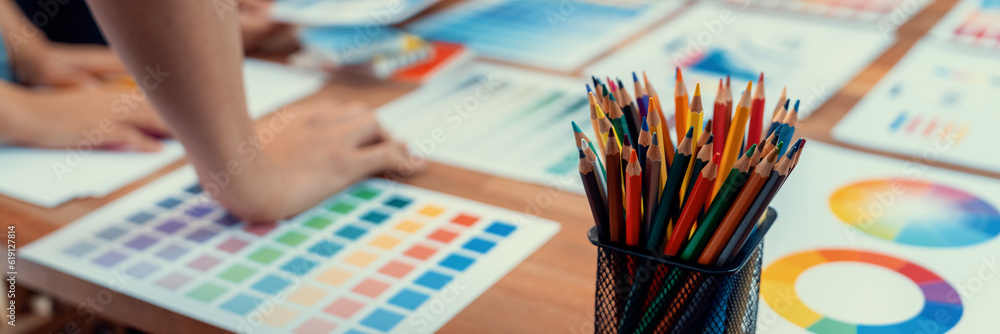 Aufkleber graphic designer brainstorm logo and graphic art at busy creative studio workshop. experiment and br