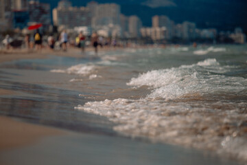 people walking on the beach