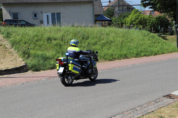 a policeman on duty on his motorcycle