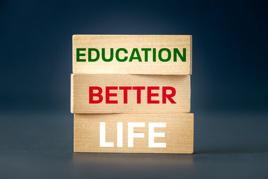 education equals a better life, Concept, written words, better life education, on wooden blocks, Motivating slogan, beautiful navy blue graphite background