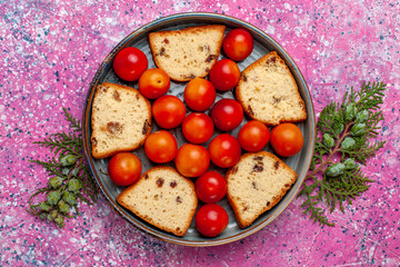 top view delicious sliced cake with sour fresh plums inside pan on pink background pie sweet sugar bake biscuit cookie fruit
