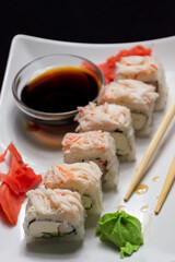 Rolls with crab meat, soy sauce, ginger and wasabi