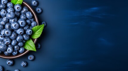 Blueberry on plate on blue background top view. Free space for text. Ai generated.