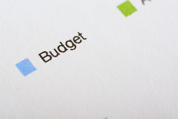 A close-up view of the phrase "budget" exemplifying the concept of wise spending.