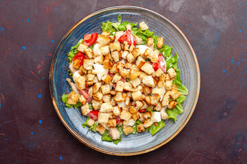top view caesar salad with sliced vegetables and rusks on dark background vegetable salad food lunch meal rusk taste