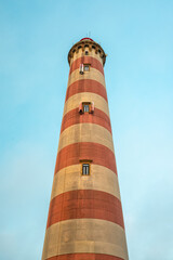 Fototapeta na wymiar Farol de Aveiro. Lighthouse in the coast of Aveiro, Portugal.