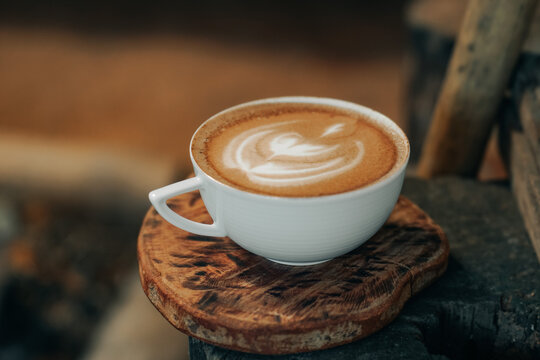 cup of hot latte art, coffee in the morning