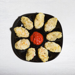 potato patties with tomato sauce