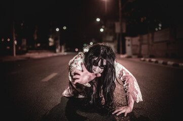 Horror woman concept,Ghost on the road in the city,A vengeful spirit on the street of the...