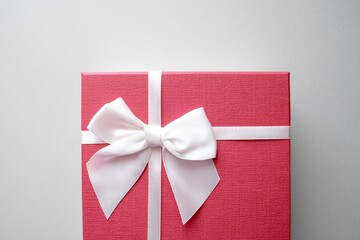  Valentine present. Gift box and red ribbon for romantic couple.