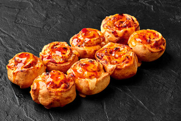 Spicy baked rolls with mozzarella, jalapeno and sweet chili sauce