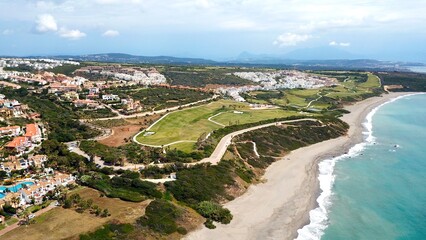 aerial view of the golf course directly at the coast of the Mediterranean Sea in La Alcaidesa,...