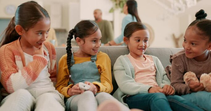 Friends, living room and children play on sofa for bonding, quality time and child development. Love, friendship and happy kids on couch talking, speaking and conversation relax on playdate at home