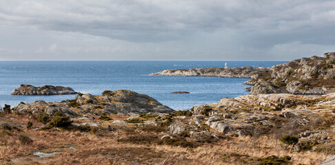 Fototapeta na wymiar Lighthouse Ansteins Fyr, Flekkeroy, Kristiansand, Norway