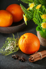 front view fresh juicy oranges on dark background citrus fruit color photo tangerine exotic tropical