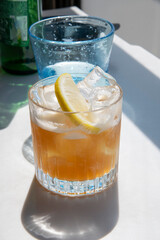 glass of ice tea with lemon